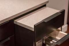 Built in pull out cutting board & opened drawers close-up , detail image, part of kitchen remodel photo gallery. Exquisite, modern design, featuring clean lines, natural wood and contemporary textures.