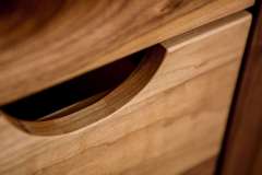 Wooden drawer handle close-up ; detail shot from bathroom remodeling project photo gallery.  Features