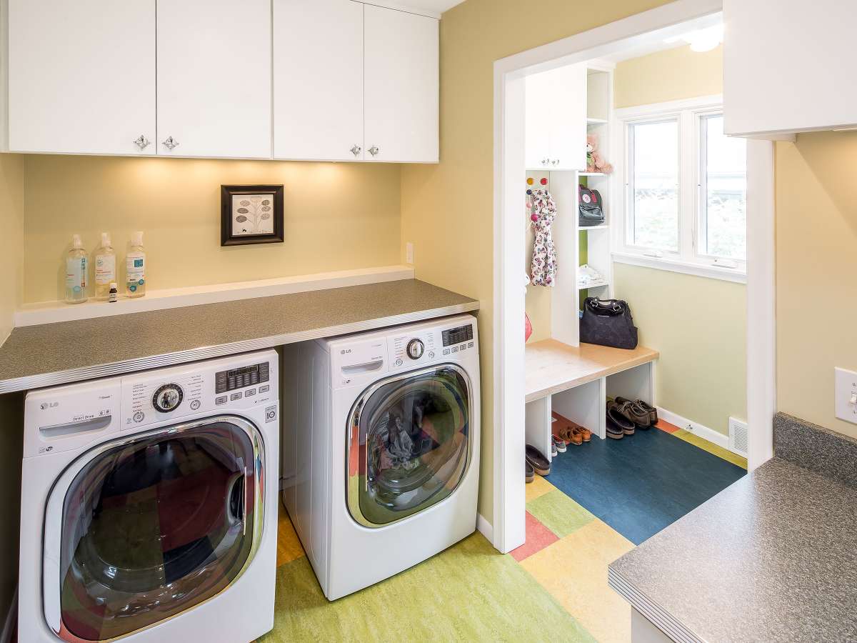 Colorful Laundry Room Brightens Every Day: Mudroom addition with laundry.  Features eclectic style with patterned floor and upbeat palette.