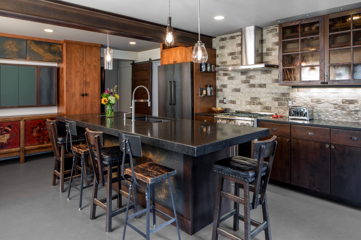Steampunk Meets Modern kitchen remodel.  Features bar-like kitchen island, coffee-shop atmosphere. 