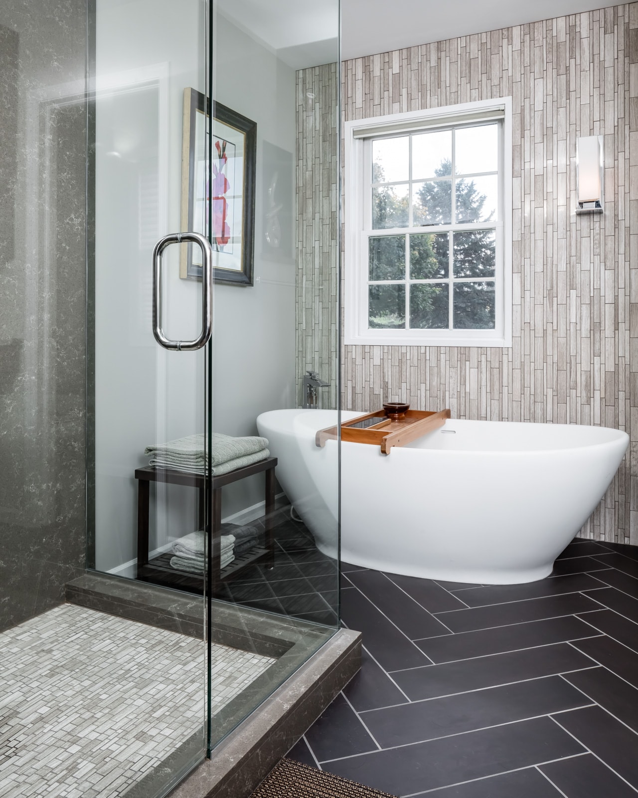 spa-like soaking tub with shower. Natural colors, window over tub