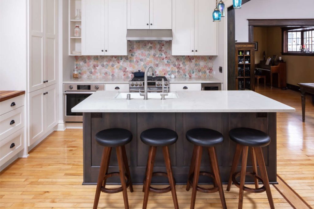 Tradition with a Twist: Transitional Design kitchen remodel - island and colorful backsplash. Features modern textures and colors, reused and recreated historical details, colorful backsplash and kitchen island.