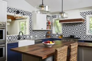 A Kitchen with a View: Kitchen remodel with bump-out addition. Transitional design, features tri-color pallete and island. 