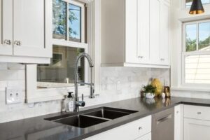 White Subway Tiles backsplash in Bluestem remodeled kitchen