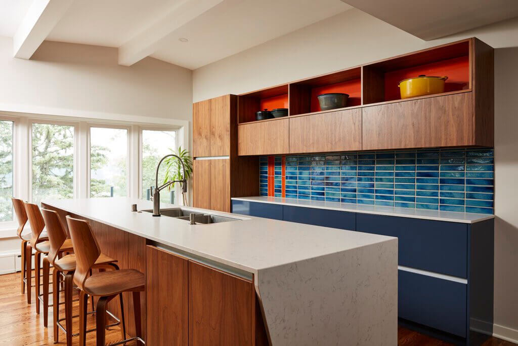 modern kitchen, blue tile backsplash, island, lots of storage