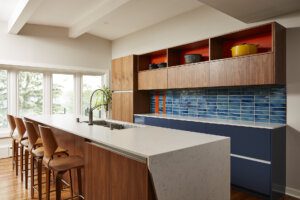 modern kitchen, blue tile backsplash, island, lots of storage